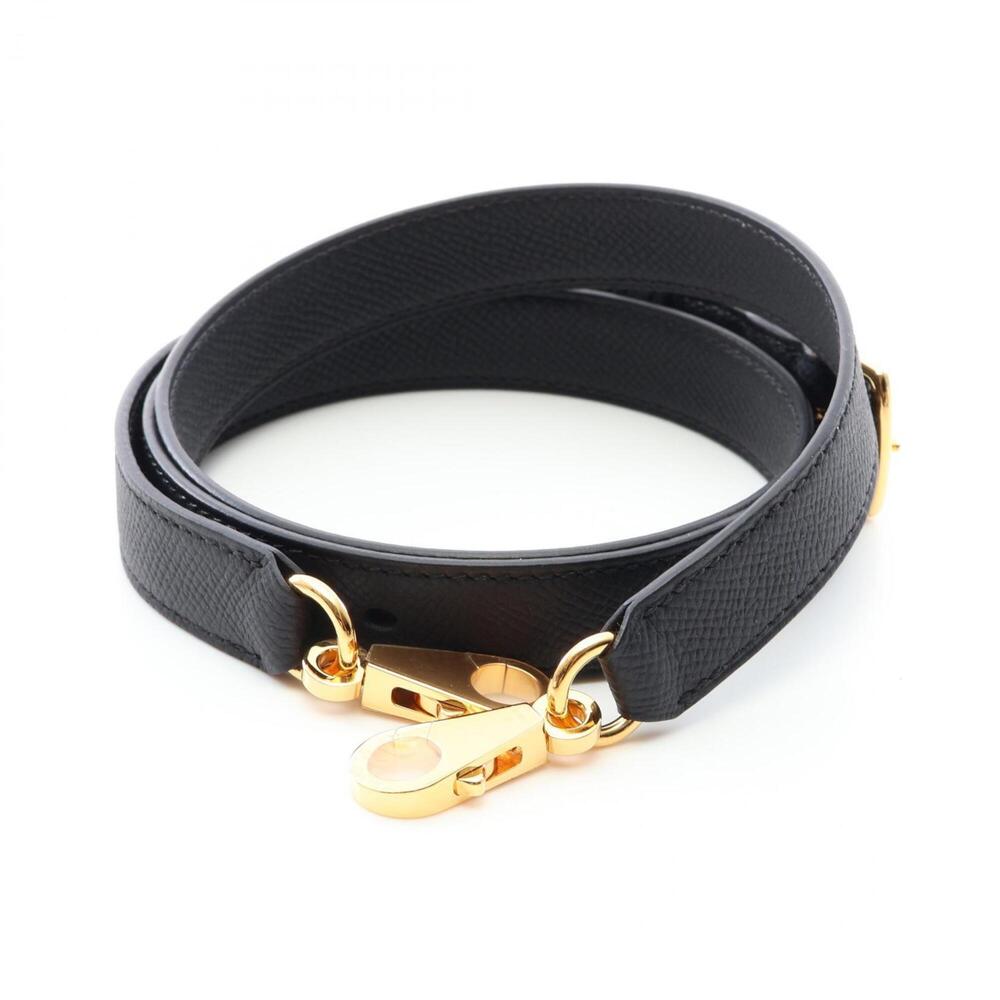 Hermes shoulder strap accessory, made of Veau Epsom leather, black, for women.